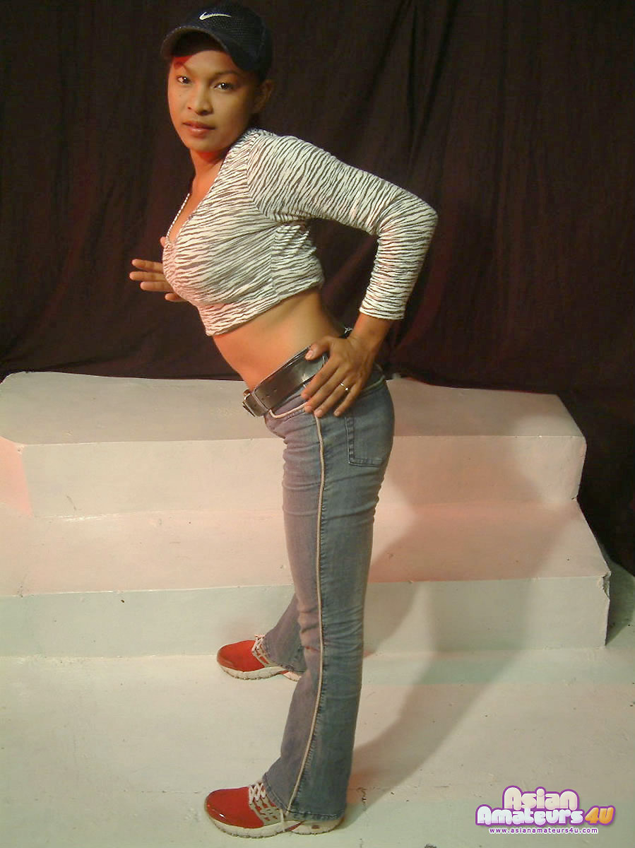 Busty Shyla poses shily during first photo shooting